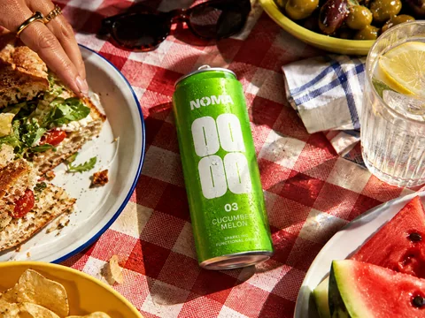 NOMA drink styled on a picnic table